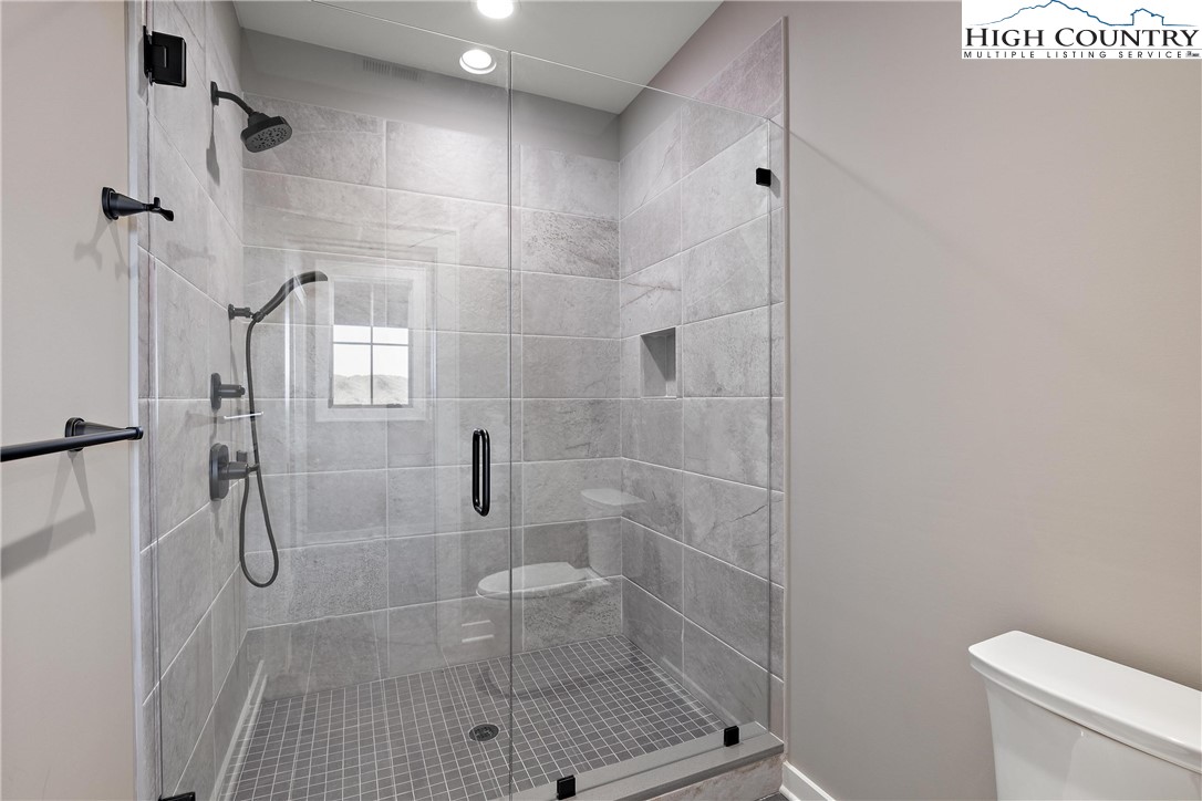 150 Calico Court Boone, NC 28607 - Photo 19 of 50 a bathroom with a shower