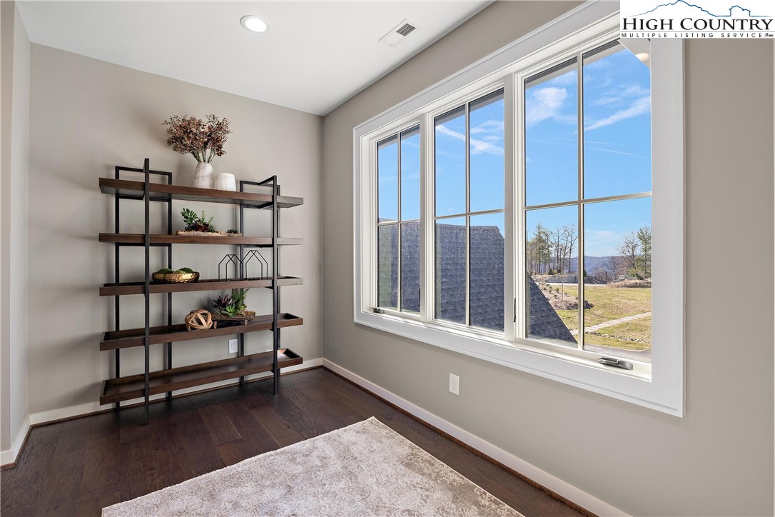 150 Calico Court Boone, NC 28607 - Photo 20 of 50 a view of a livingroom with a book shelf
