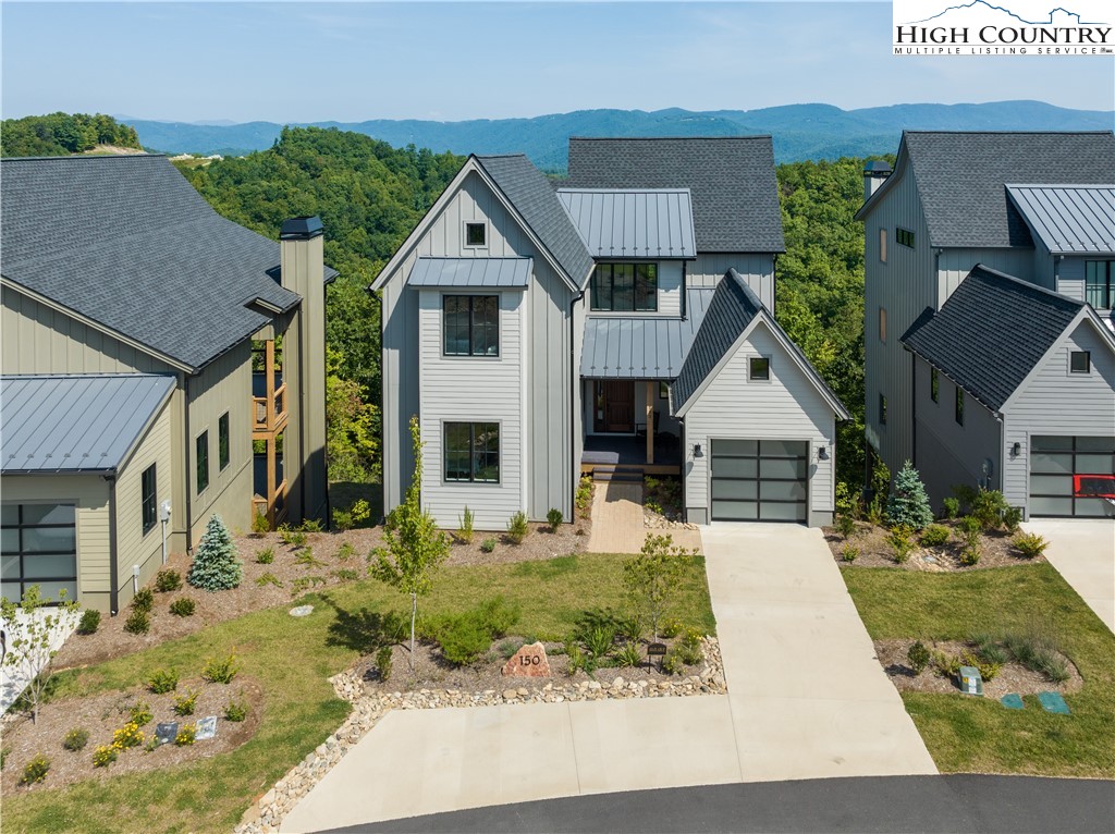 150 Calico Court Boone, NC 28607 - Photo 2 of 50 front view of a house with a yard
