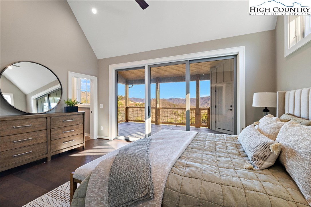 150 Calico Court Boone, NC 28607 - Photo 22 of 50 a bedroom with a large bed and a window