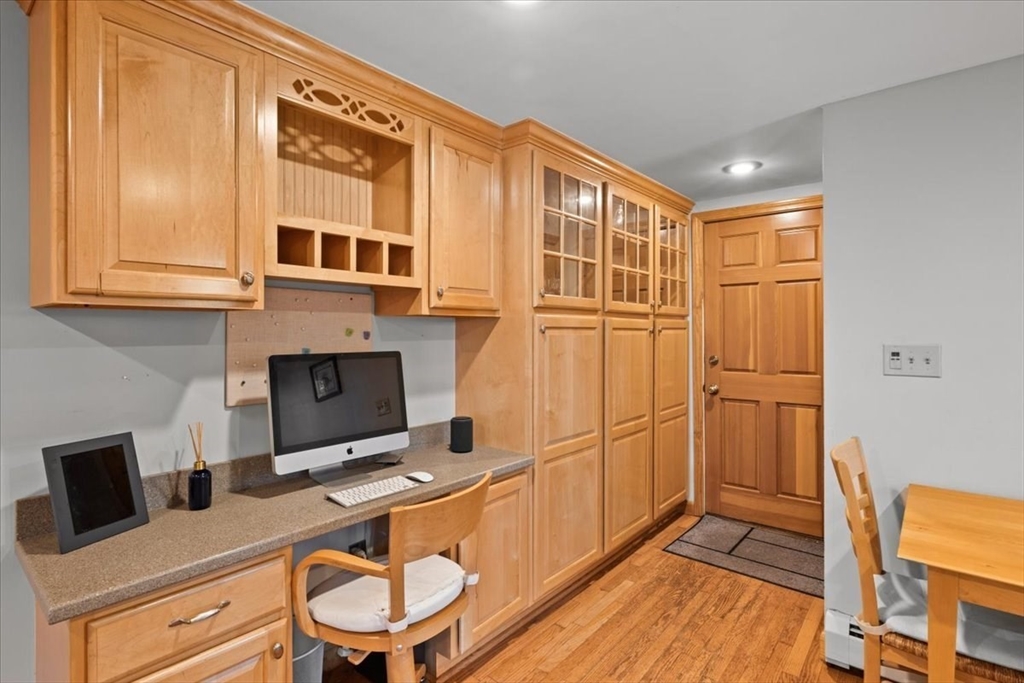 261 Emmett Street Fall River, MA 02721 - Photo 13 of 40 a room with furniture a flat screen tv and a fireplace