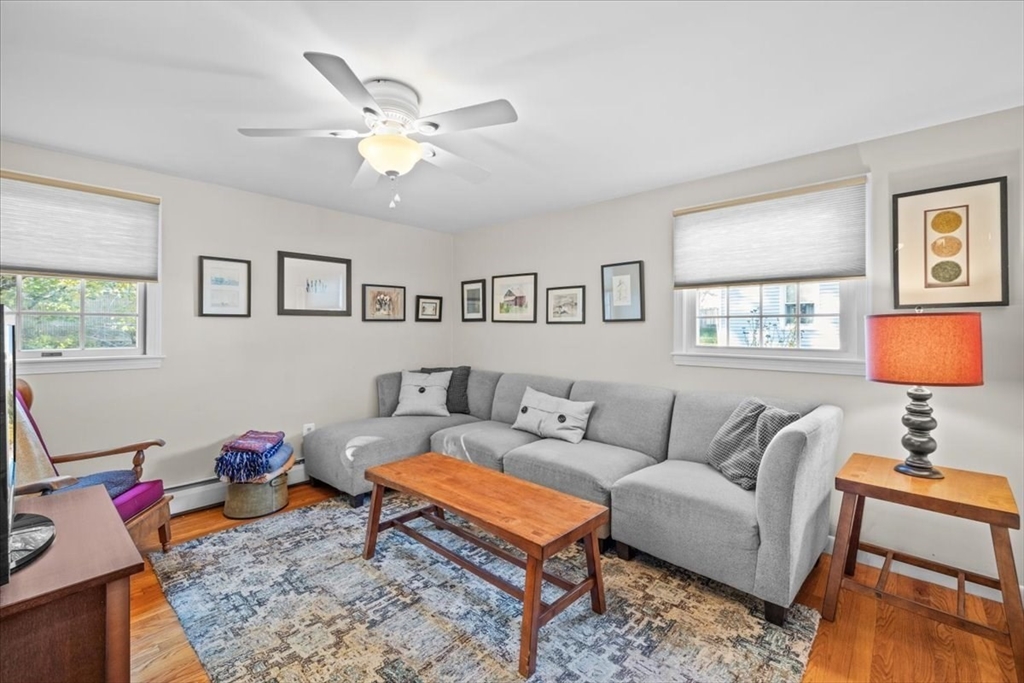 261 Emmett Street Fall River, MA 02721 - Photo 20 of 40 a living room with furniture a rug and a window
