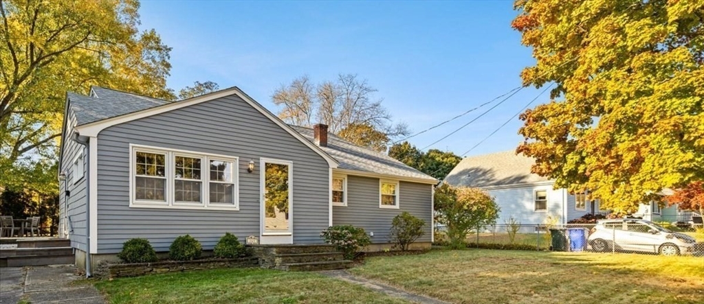 261 Emmett Street Fall River, MA 02721 - Photo 2 of 40 a view of a house with a yard