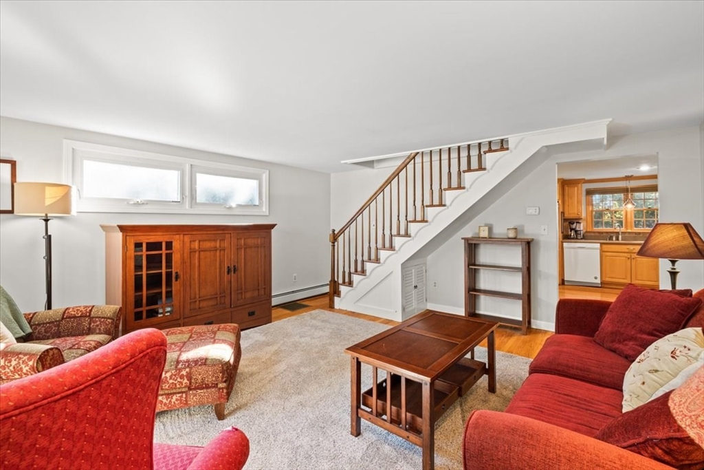 261 Emmett Street Fall River, MA 02721 - Photo 30 of 40 a living room with furniture a ceiling fan and a window