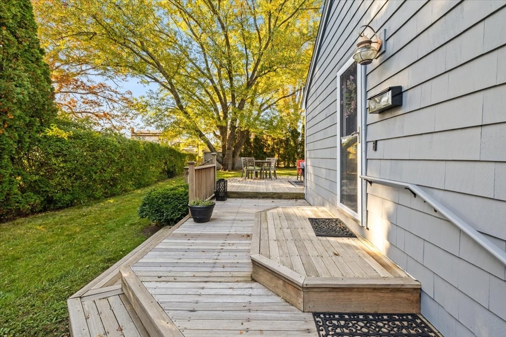 261 Emmett Street Fall River, MA 02721 - Photo 3 of 40 a view of a patio with a yard