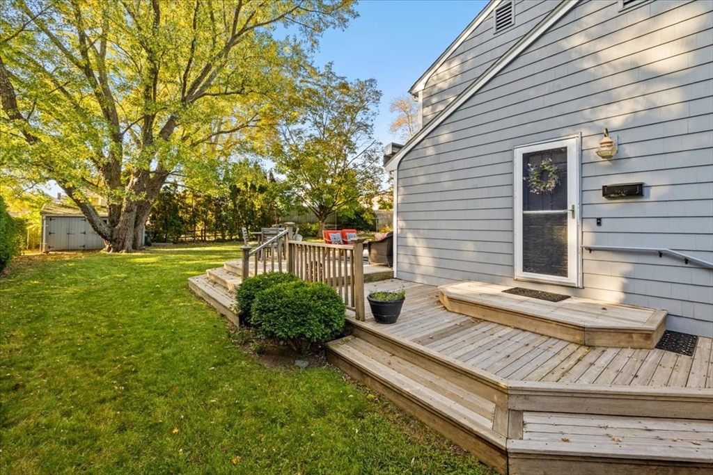 261 Emmett Street Fall River, MA 02721 - Photo 4 of 40 a front view of a house with garden