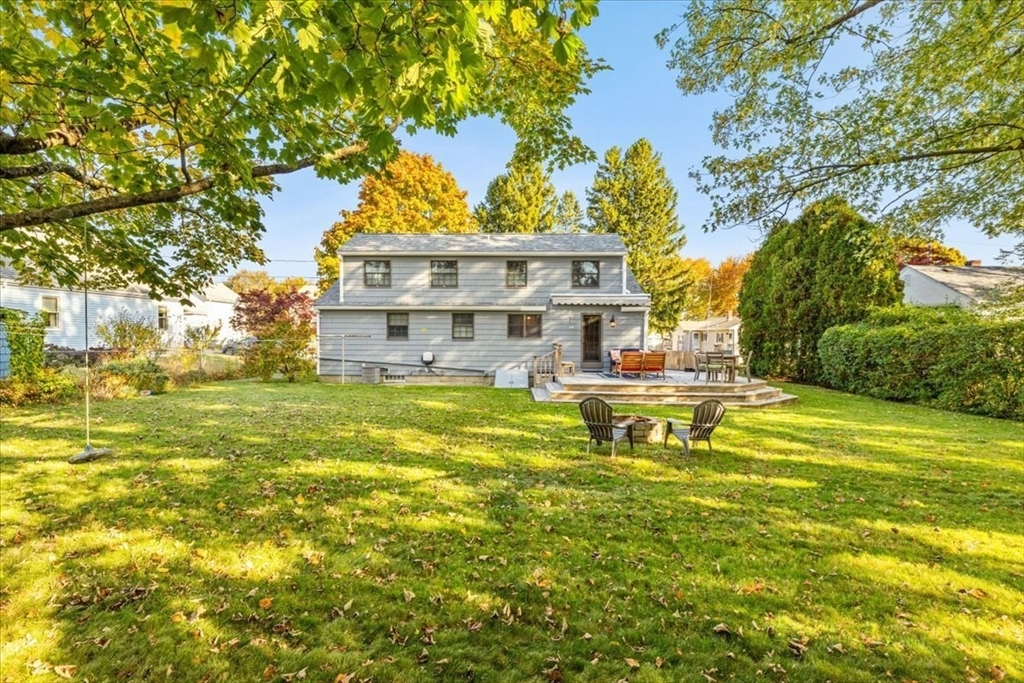 261 Emmett Street Fall River, MA 02721 - Photo 9 of 40 a view of a house with a swimming pool