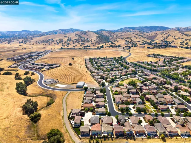 an aerial view of residential building with outdoor space