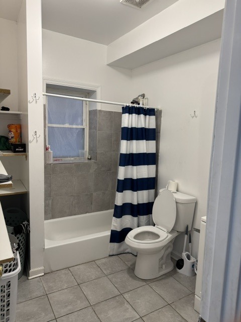 3949 West Monroe Street Chicago, IL 60624 - Photo 4 of 7 a bathroom with a toilet and a shower