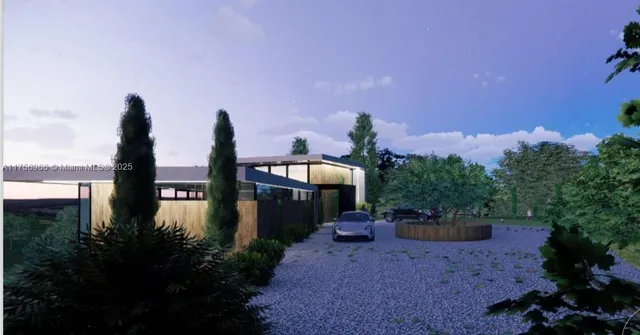 a front view of a house with a yard and mountain view