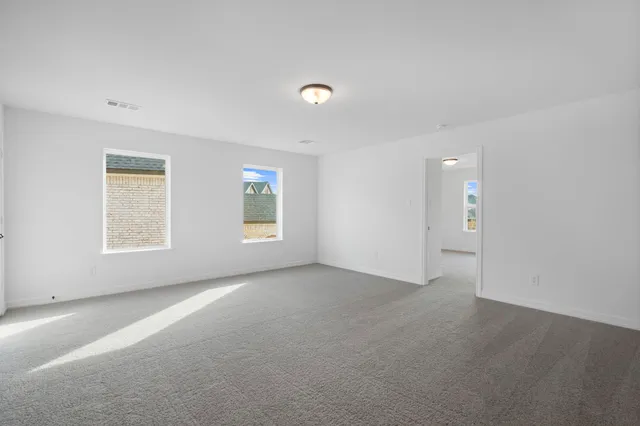 an empty room with windows