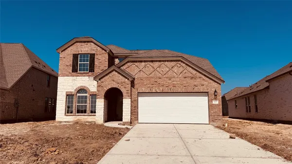 a wooden bench sitting in front of a window
