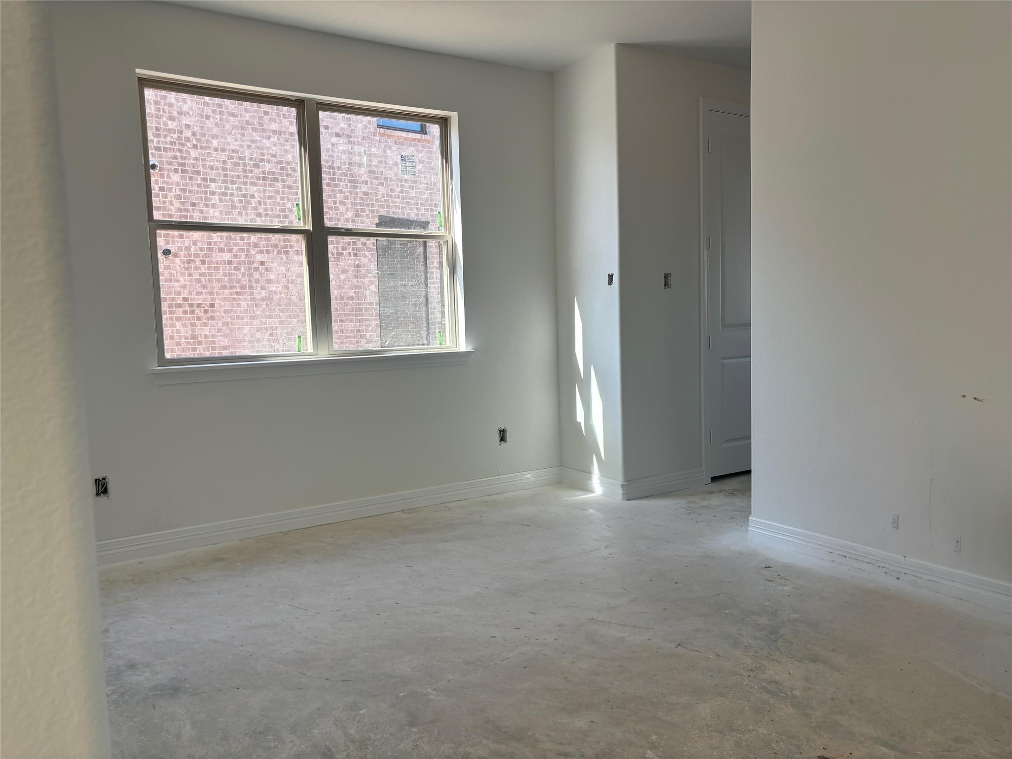 7822 Jasper Meadows Way Angleton, TX 77515 - Photo 19 of 33 an empty room with windows