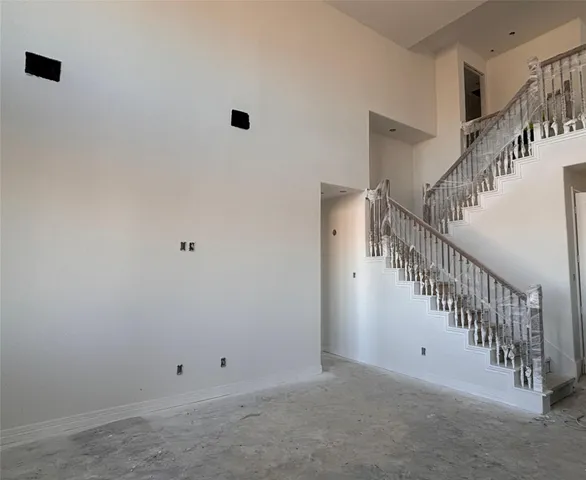 a view of entryway with stairs