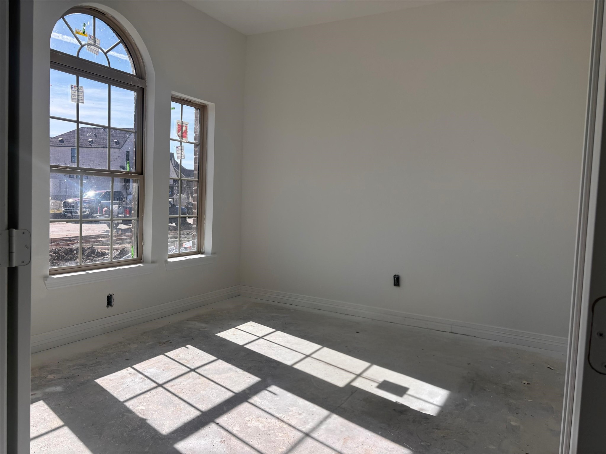 7822 Jasper Meadows Way Angleton, TX 77515 - Photo 27 of 33 a wooden bench sitting in front of a window