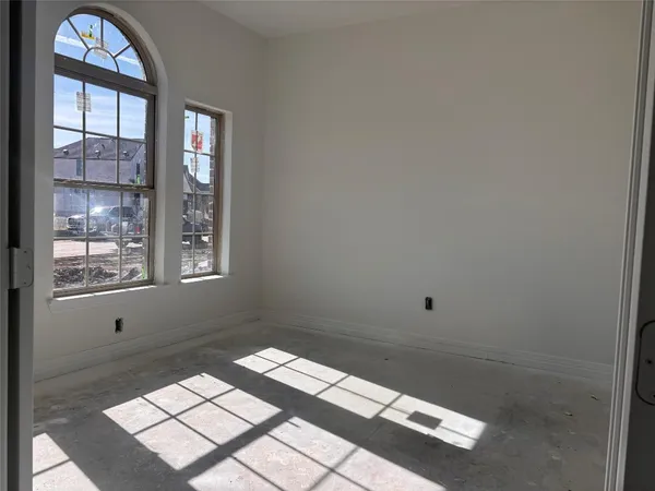 a kitchen with kitchen island a sink appliances and cabinets