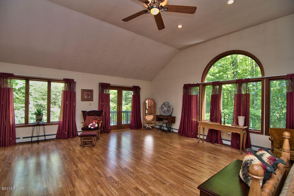 1 East Lake Road Moscow, PA 18444 - Photo 15 of 88 a living room with furniture and a large window