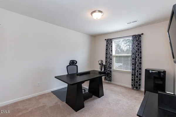 a room with furniture and window
