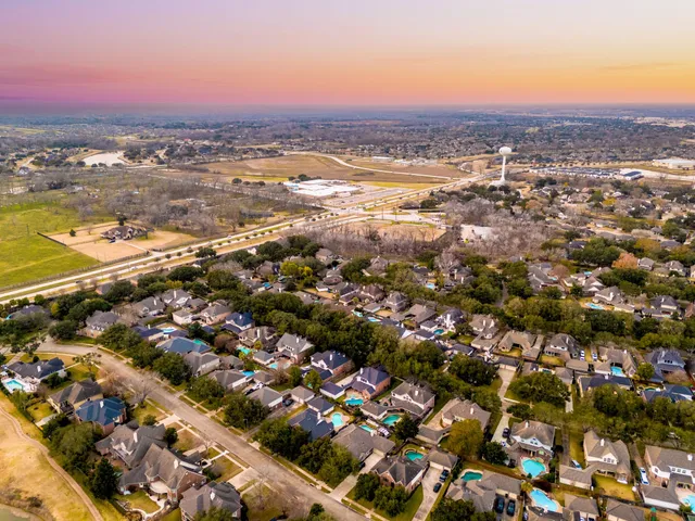 an aerial view of residential building and lake view