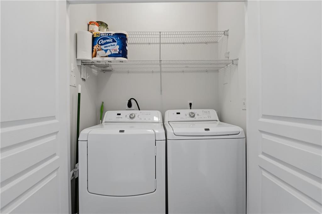 10 Perimeter Summit Boulevard, Unit 3311 Atlanta, GA 30319 - Photo 16 of 68 a utility room with dryer and washer