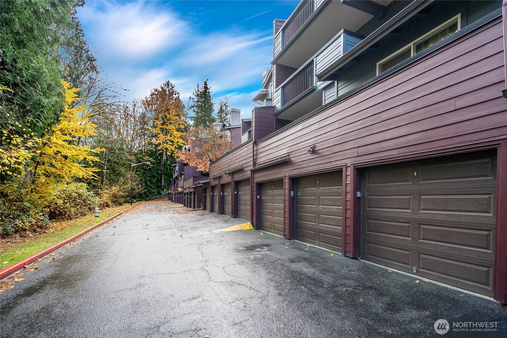 15615 Waynita Way Northeast, Unit B303 Bothell, WA 98011 - Photo 16 of 30 a view of a house with a garage