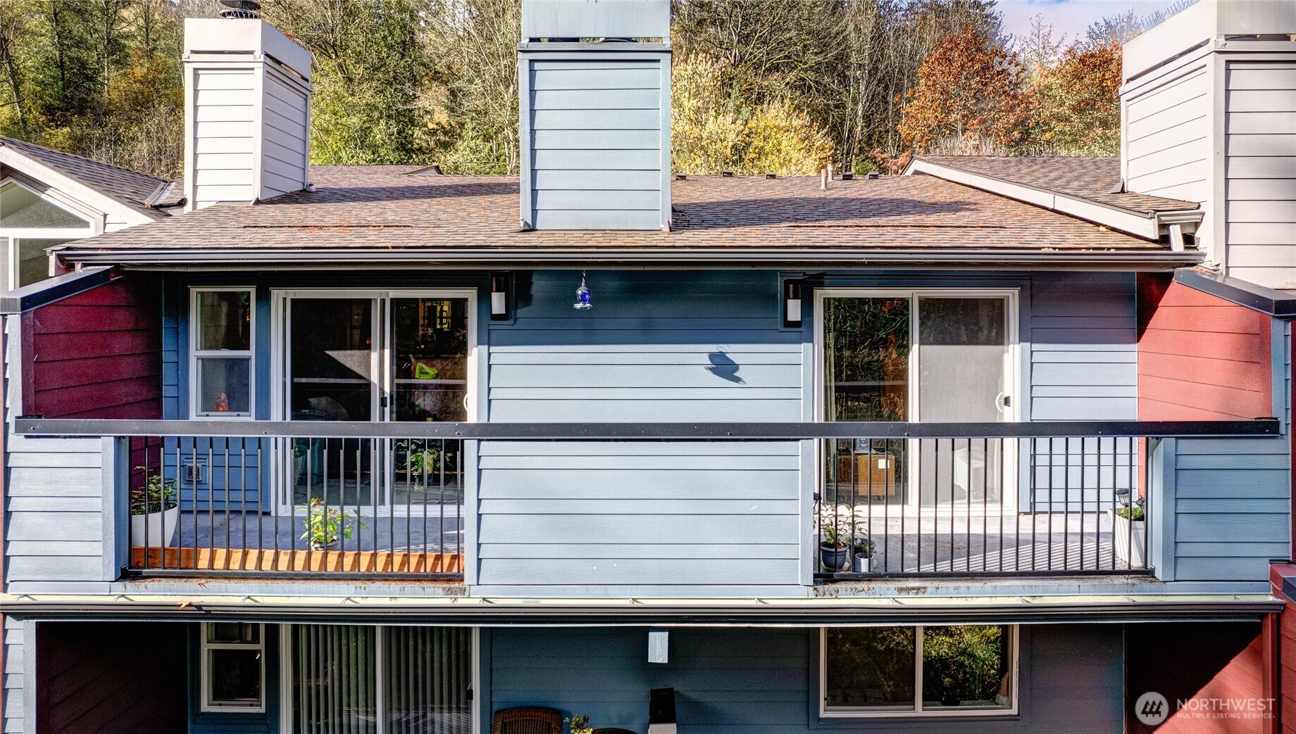 15615 Waynita Way Northeast, Unit B303 Bothell, WA 98011 - Photo 2 of 30 a front view of a house with a balcony