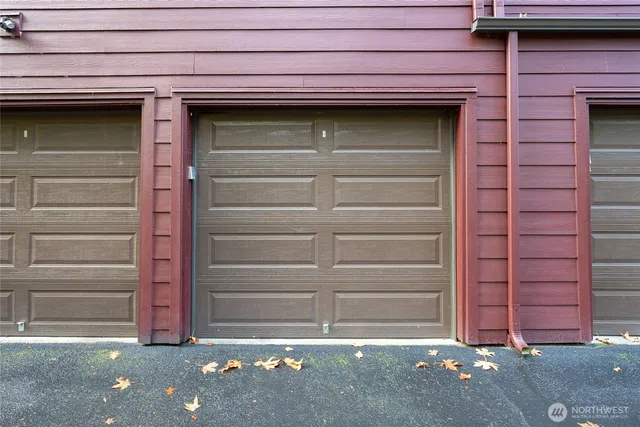 a front view of a house with a garage