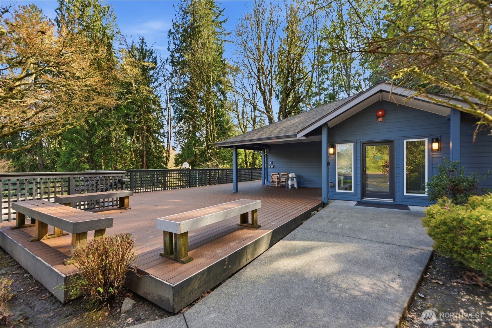 15615 Waynita Way Northeast, Unit B303 Bothell, WA 98011 - Photo 26 of 30 a view of a house with a chairs and wooden fence