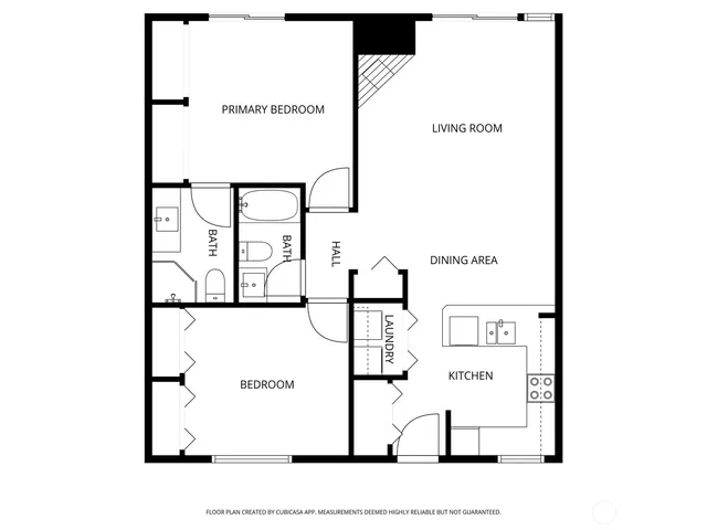 a picture of a bench in front of a wall