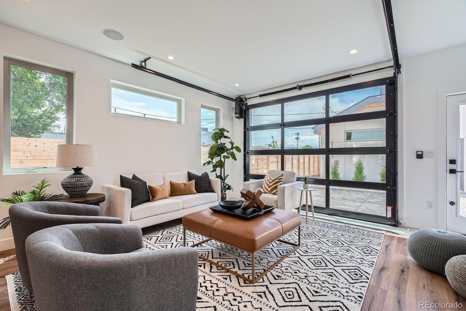 4474 Utica Street Denver, CO 80212 - Photo 14 of 40 a living room with furniture and a window