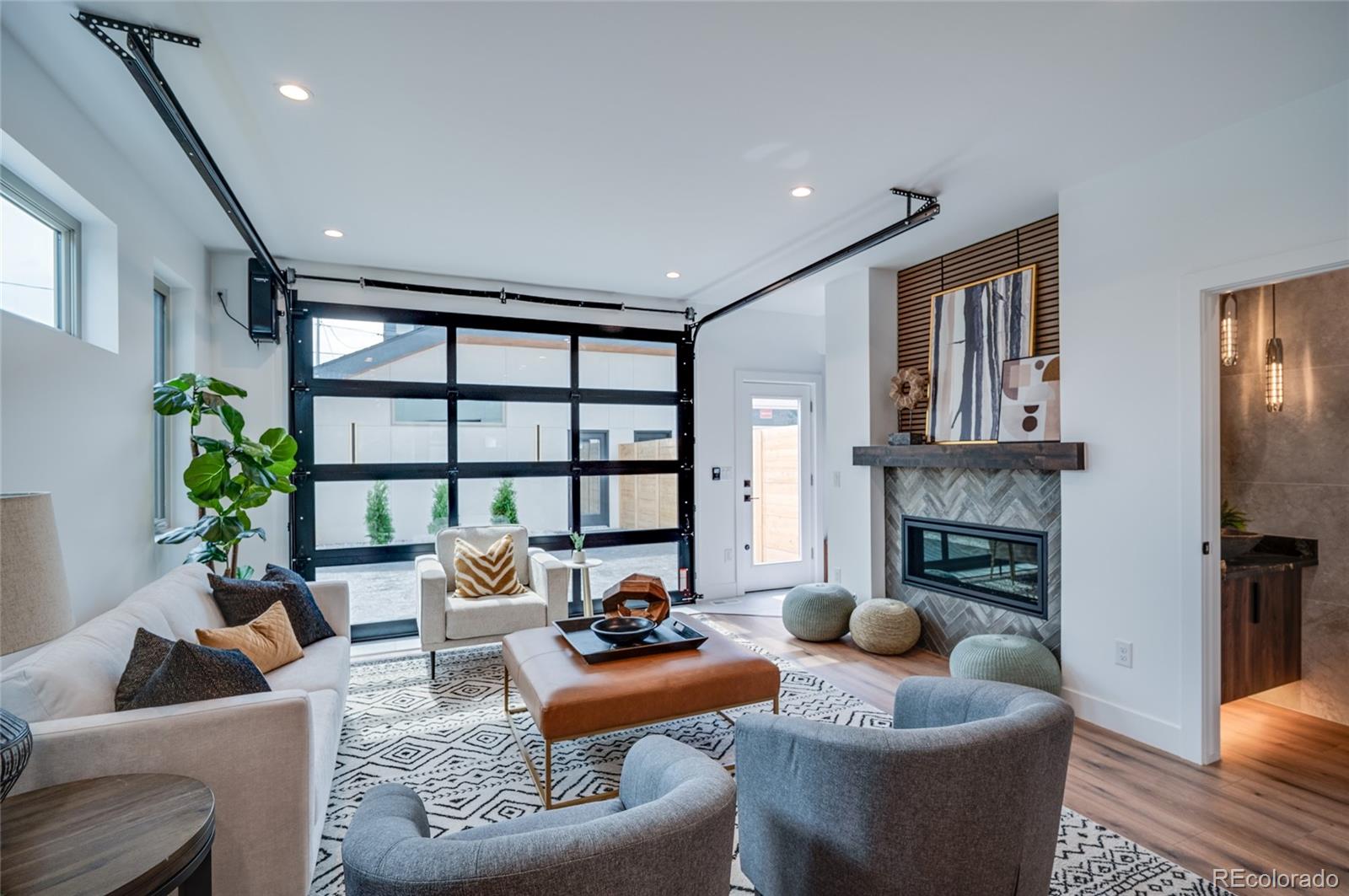4474 Utica Street Denver, CO 80212 - Photo 15 of 40 a living room with furniture fireplace and a large window