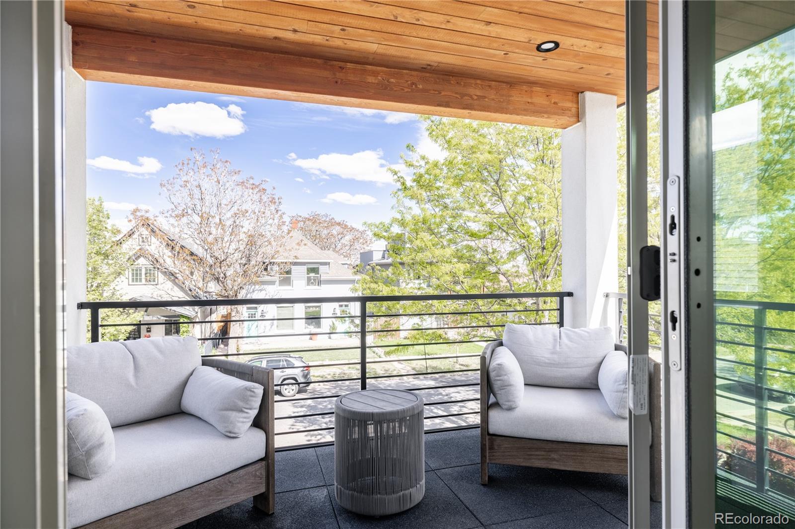 4474 Utica Street Denver, CO 80212 - Photo 22 of 40 a view of a living room with a couch