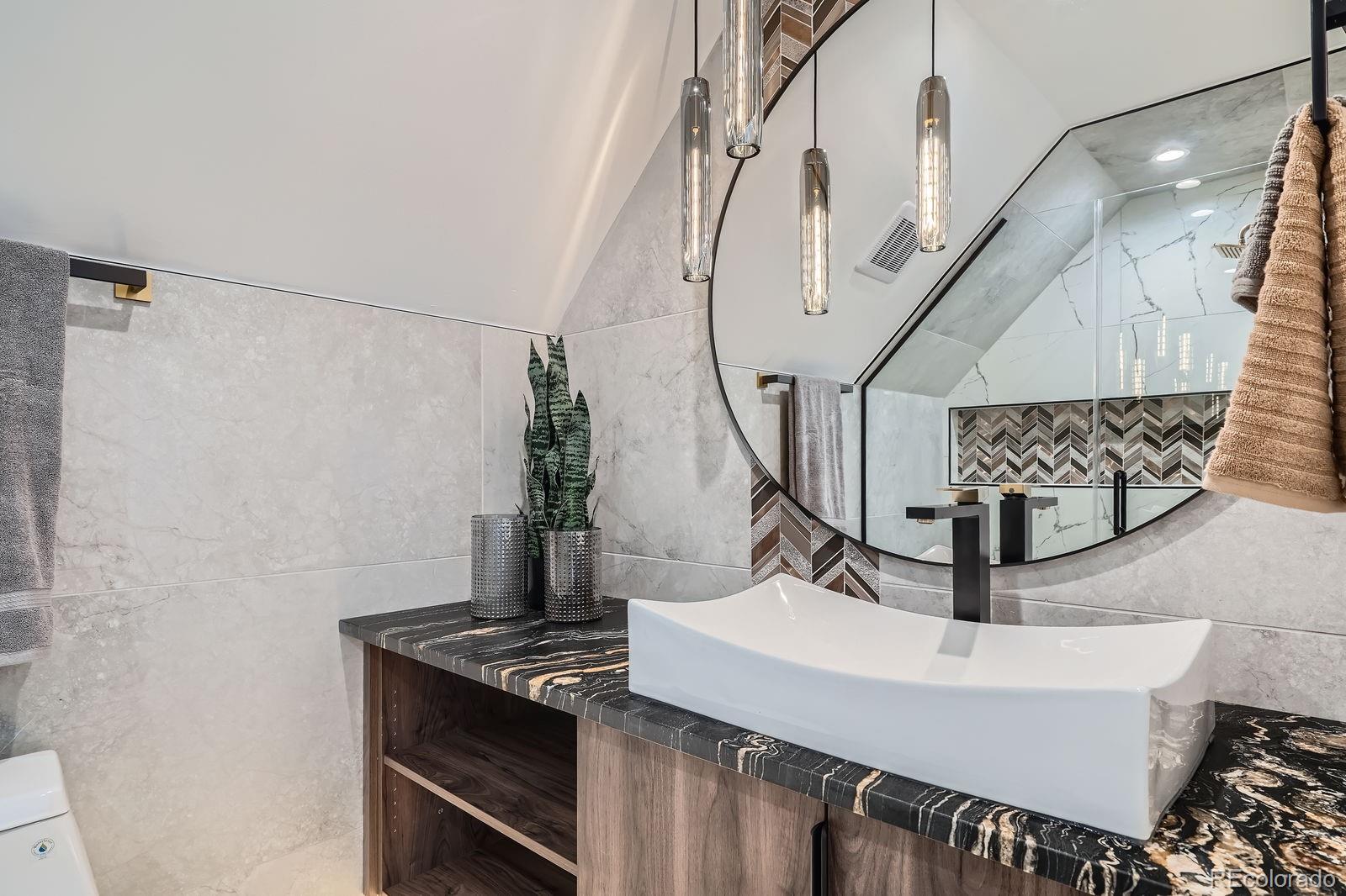 4474 Utica Street Denver, CO 80212 - Photo 28 of 40 a view of entryway and kitchen