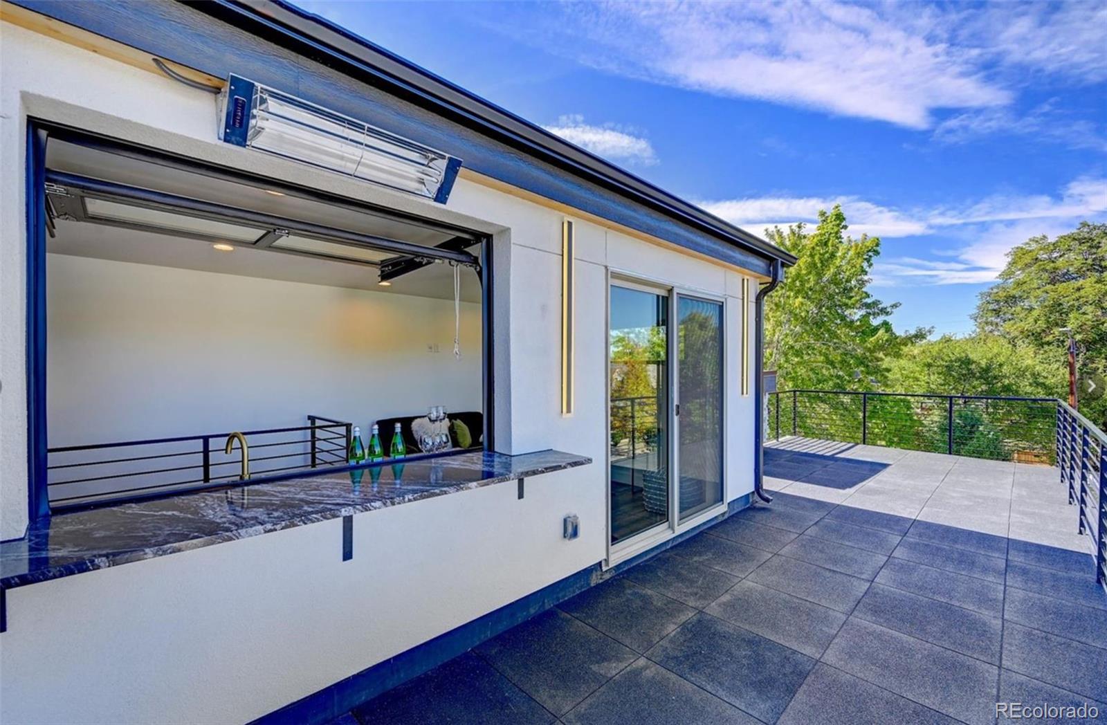 4474 Utica Street Denver, CO 80212 - Photo 32 of 40 a view of a porch with furniture