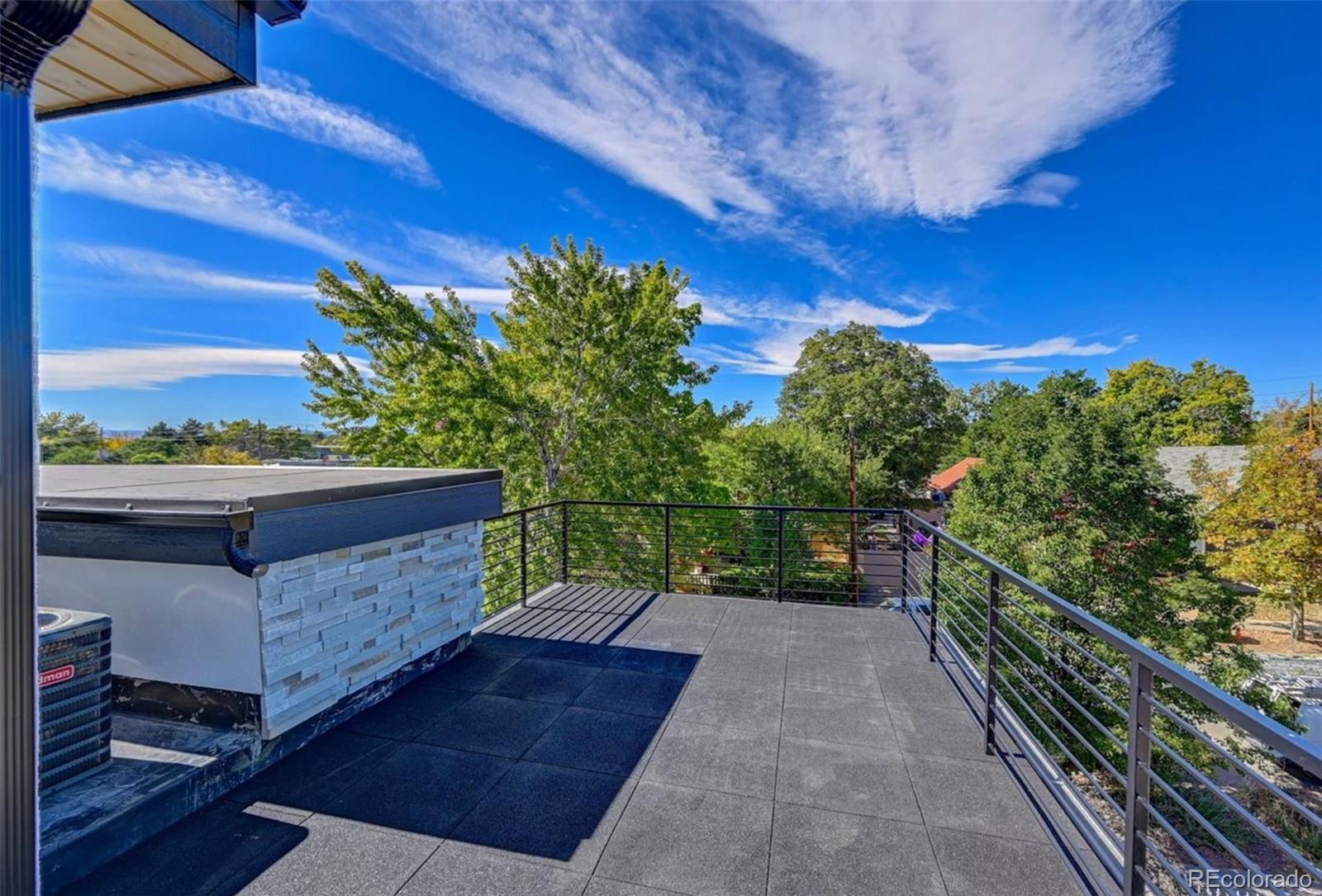 4474 Utica Street Denver, CO 80212 - Photo 34 of 40 a view of a terrace with outdoor space