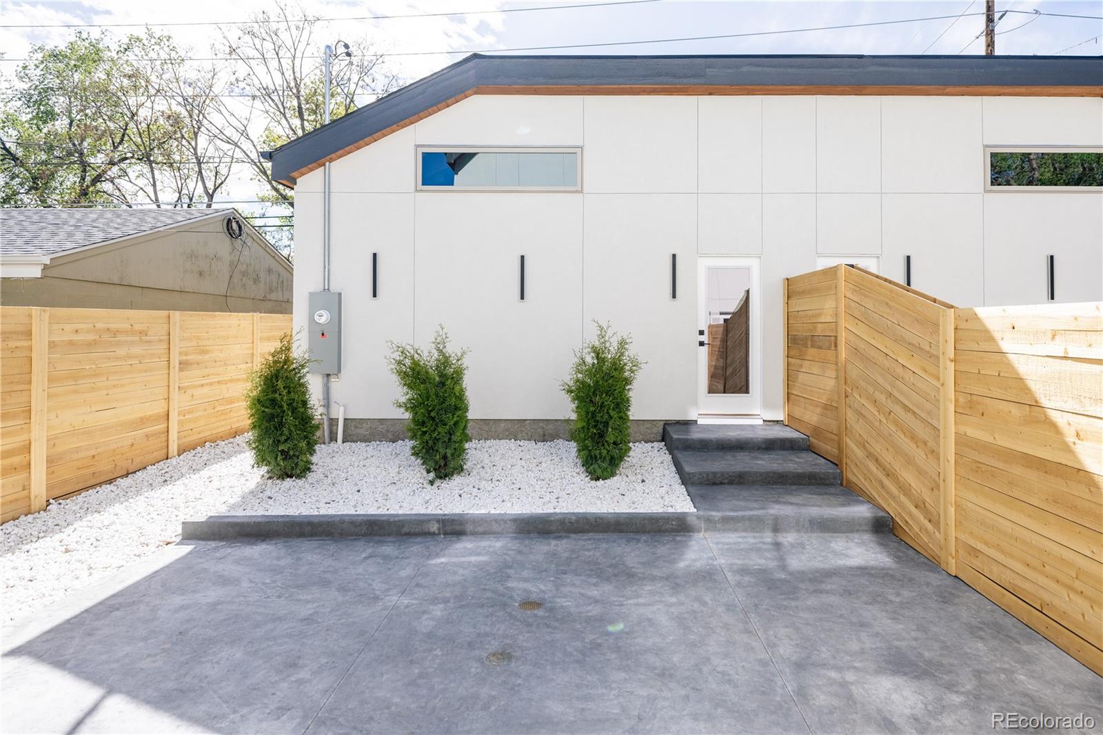 4474 Utica Street Denver, CO 80212 - Photo 39 of 40 a view of a back yard of the building