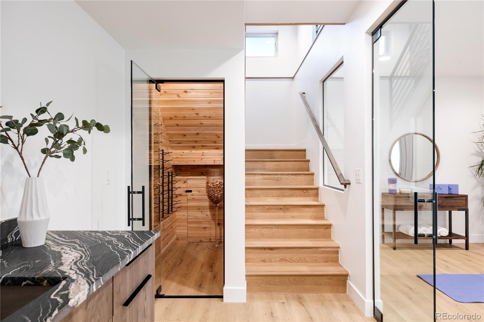 4474 Utica Street Denver, CO 80212 - Photo 40 of 43 a view of entryway and hall with wooden floor
