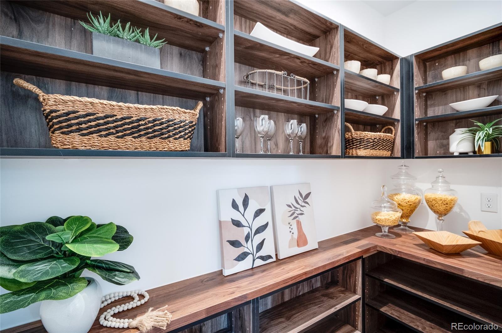 4474 Utica Street Denver, CO 80212 - Photo 9 of 40 a vase of flowers sitting on a shelf