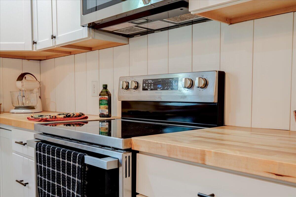 4534 Main Street Drakes Branch, VA 23937 - Photo 13 of 36 a kitchen with a stove and a microwave