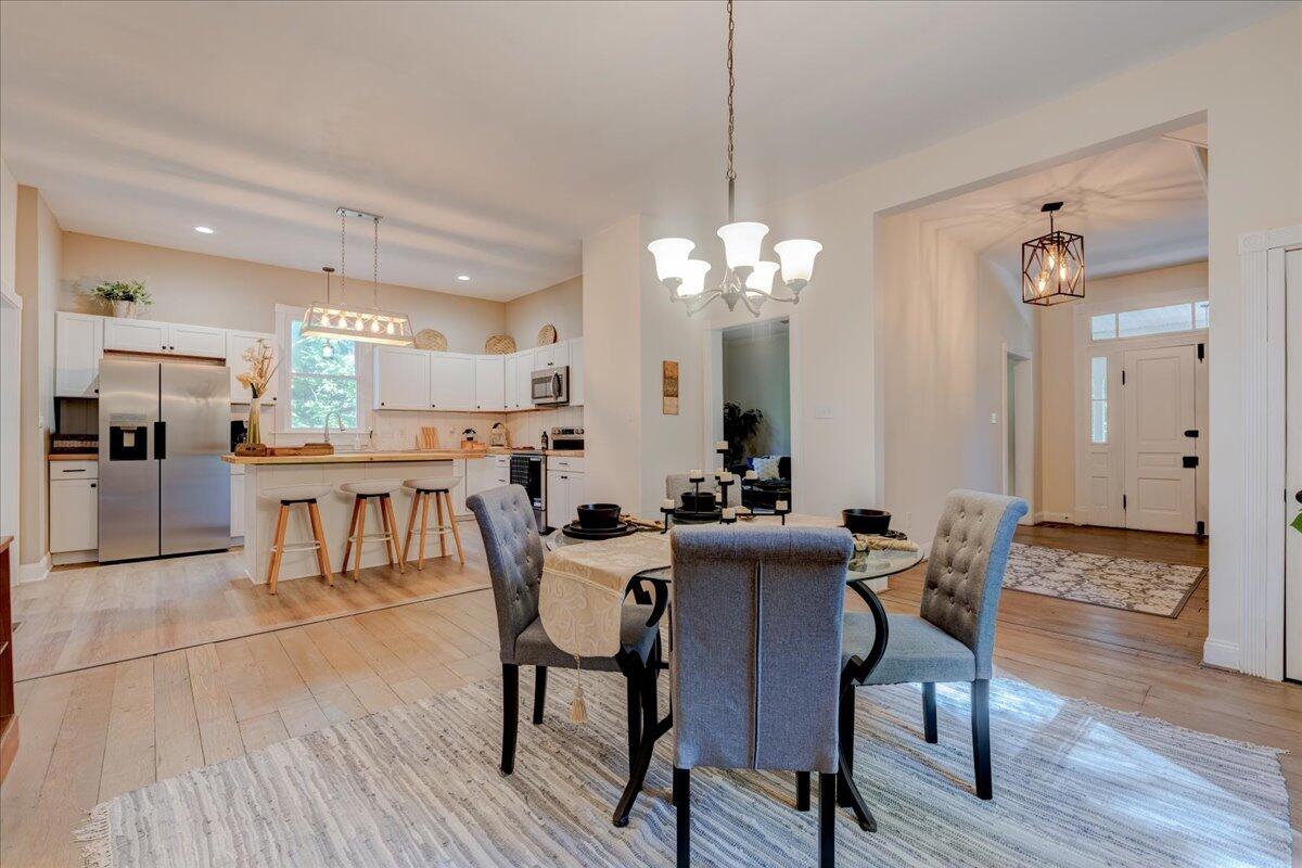 4534 Main Street Drakes Branch, VA 23937 - Photo 16 of 36 a view of a dining room with furniture and wooden floor