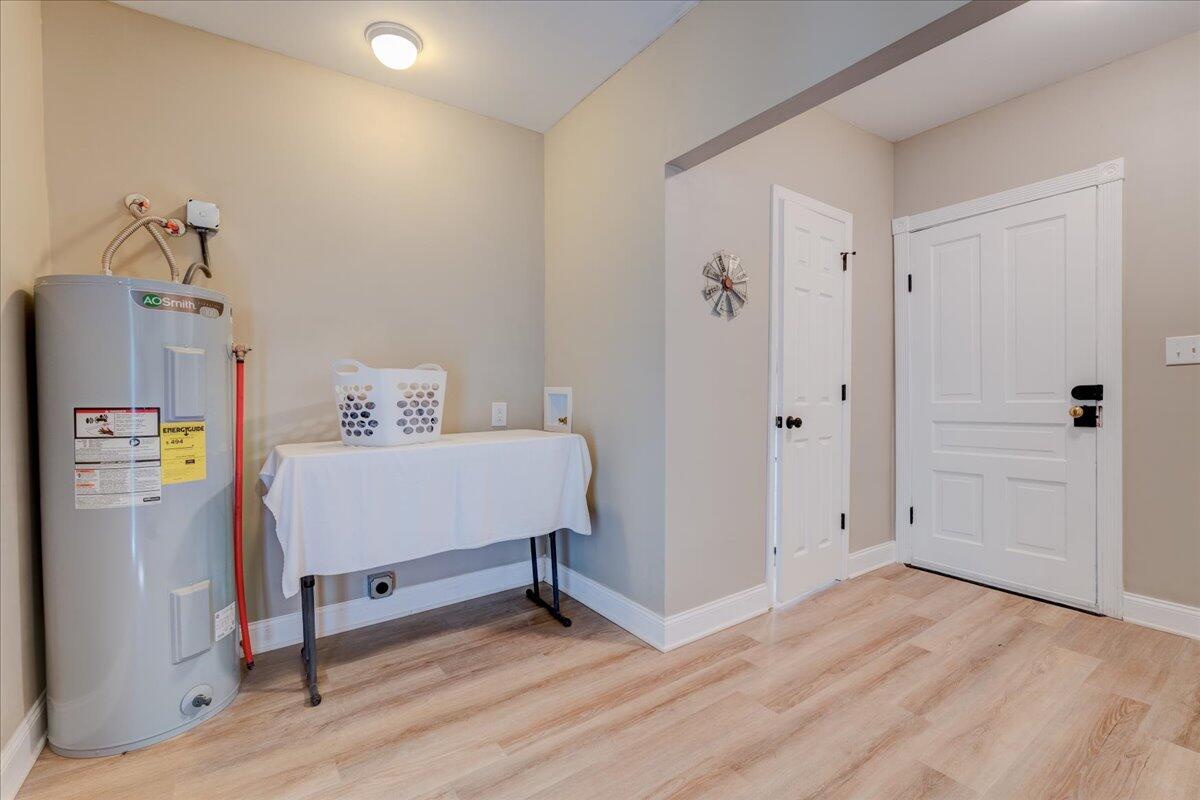4534 Main Street Drakes Branch, VA 23937 - Photo 19 of 36 a very nice looking room with a wooden floor