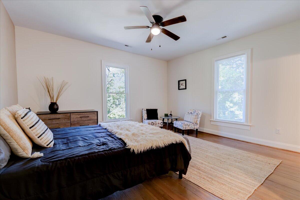 4534 Main Street Drakes Branch, VA 23937 - Photo 22 of 36 a bedroom with a bed and wooden floor