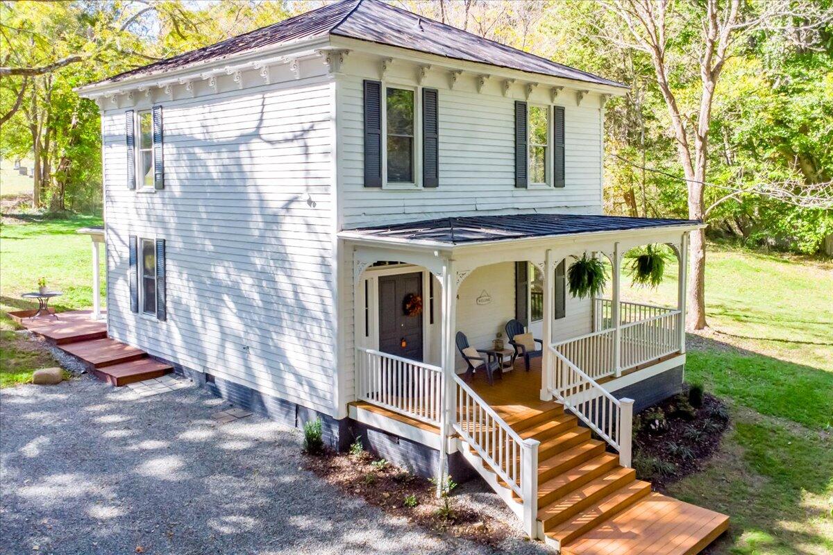 4534 Main Street Drakes Branch, VA 23937 - Photo 31 of 36 a view of a house with backyard porch and wooden floor