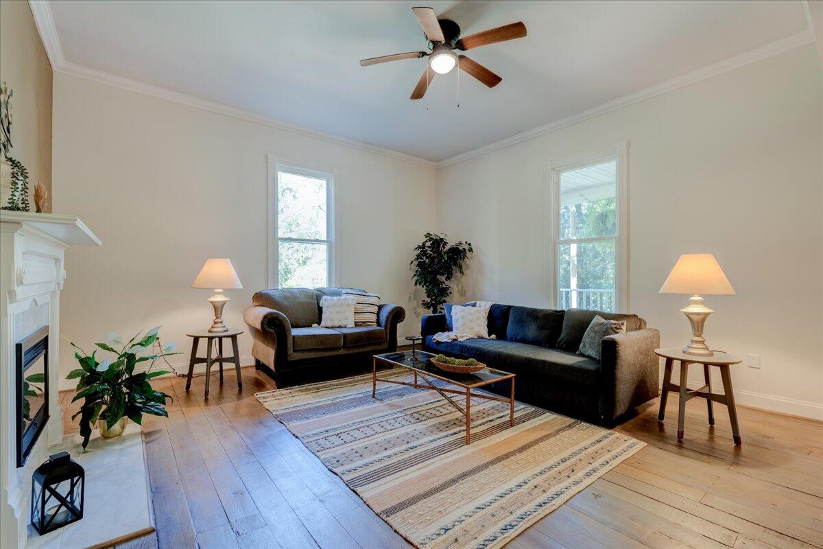4534 Main Street Drakes Branch, VA 23937 - Photo 4 of 36 a living room with furniture and a wooden floor