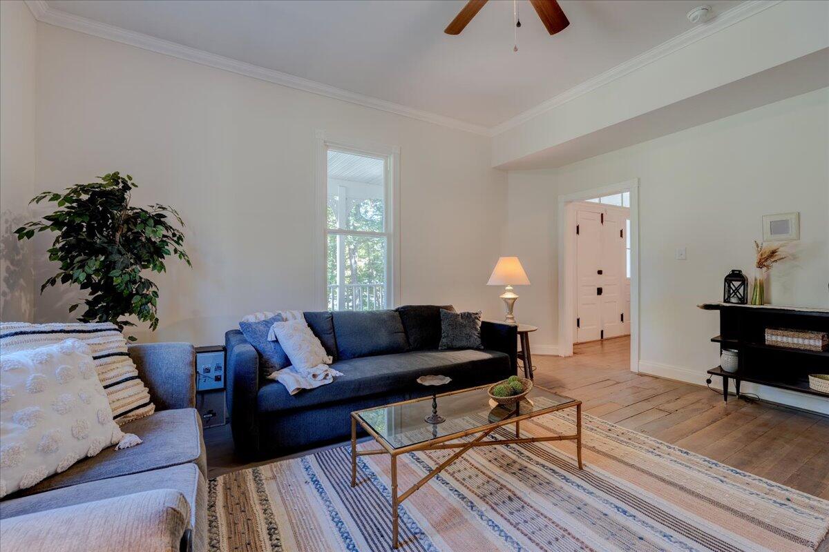 4534 Main Street Drakes Branch, VA 23937 - Photo 5 of 36 a living room with furniture and a chandelier
