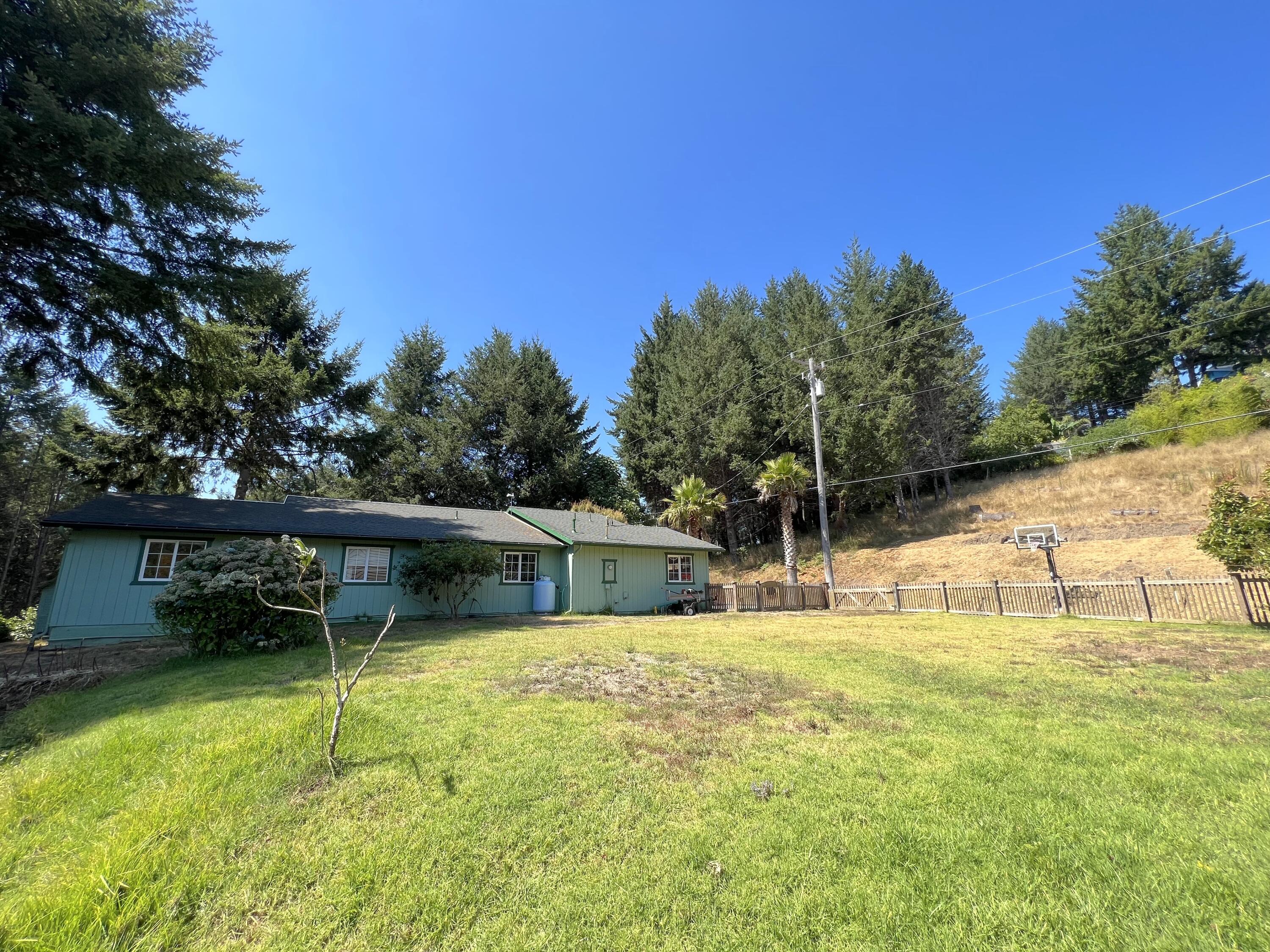 482 Spring Road Shelter Cove, CA 95589 - Photo 46 of 58 side yard to house wide