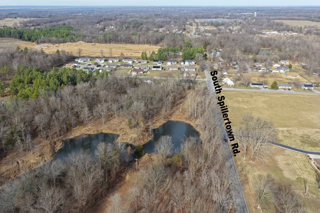 a view of a lake with a yard