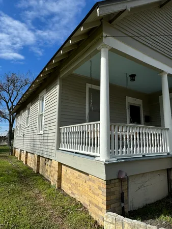 a view of a house with a deck
