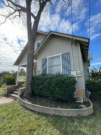 a house that has a tree in it