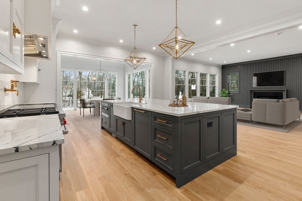 76 Bristol Road Wellesley, MA 02481 - Photo 3 of 36 a large kitchen with a large counter space a sink stainless steel appliances and cabinets